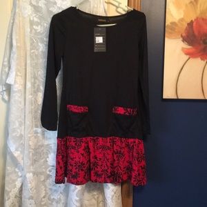 Black and red tunic. NWT